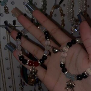 Black and Red Beaded Bracelets with Charms